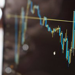 Computer screen showing financial charts